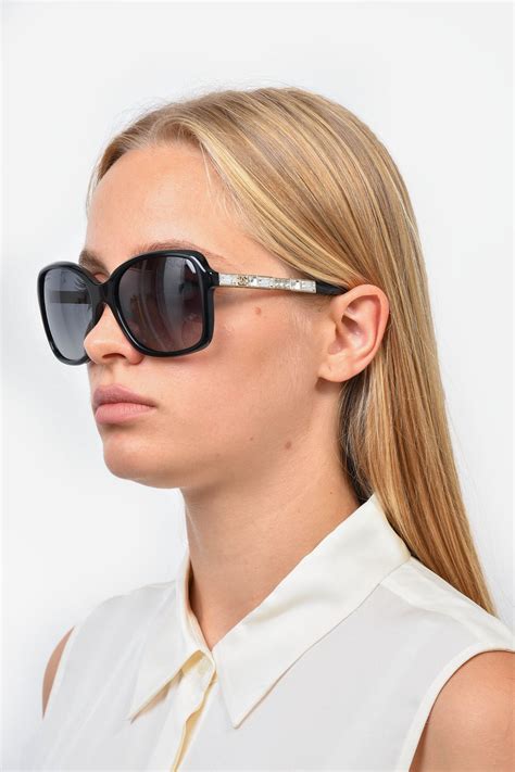 chanel black oversized sunglasses.